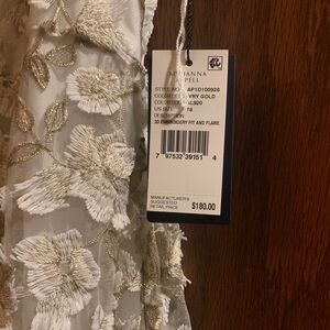 Beautiful ivory lace and gold dress. Perfect for mother of the bride.